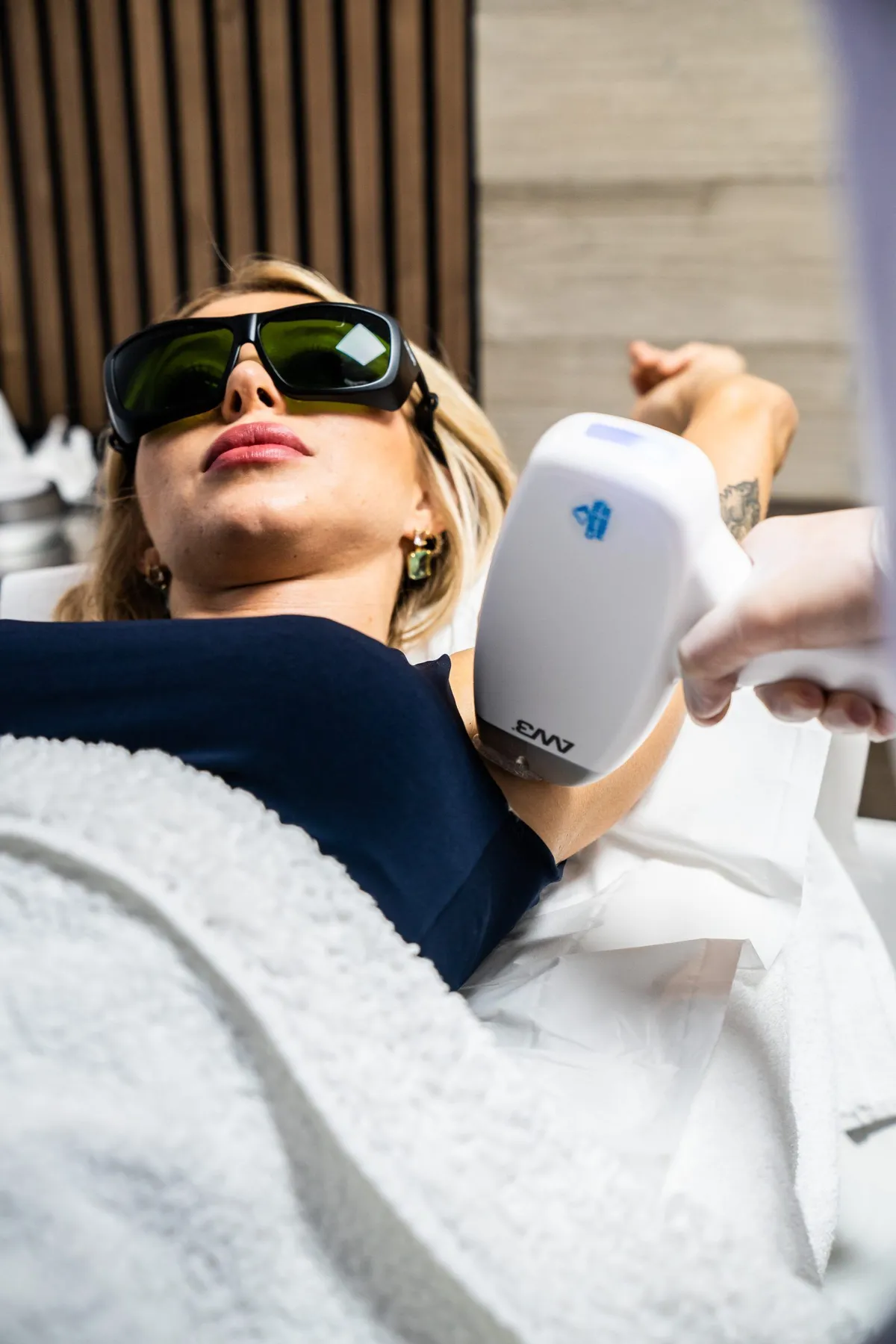 A client undergoing a laser hair removal treatment at Sorellina Clinic
