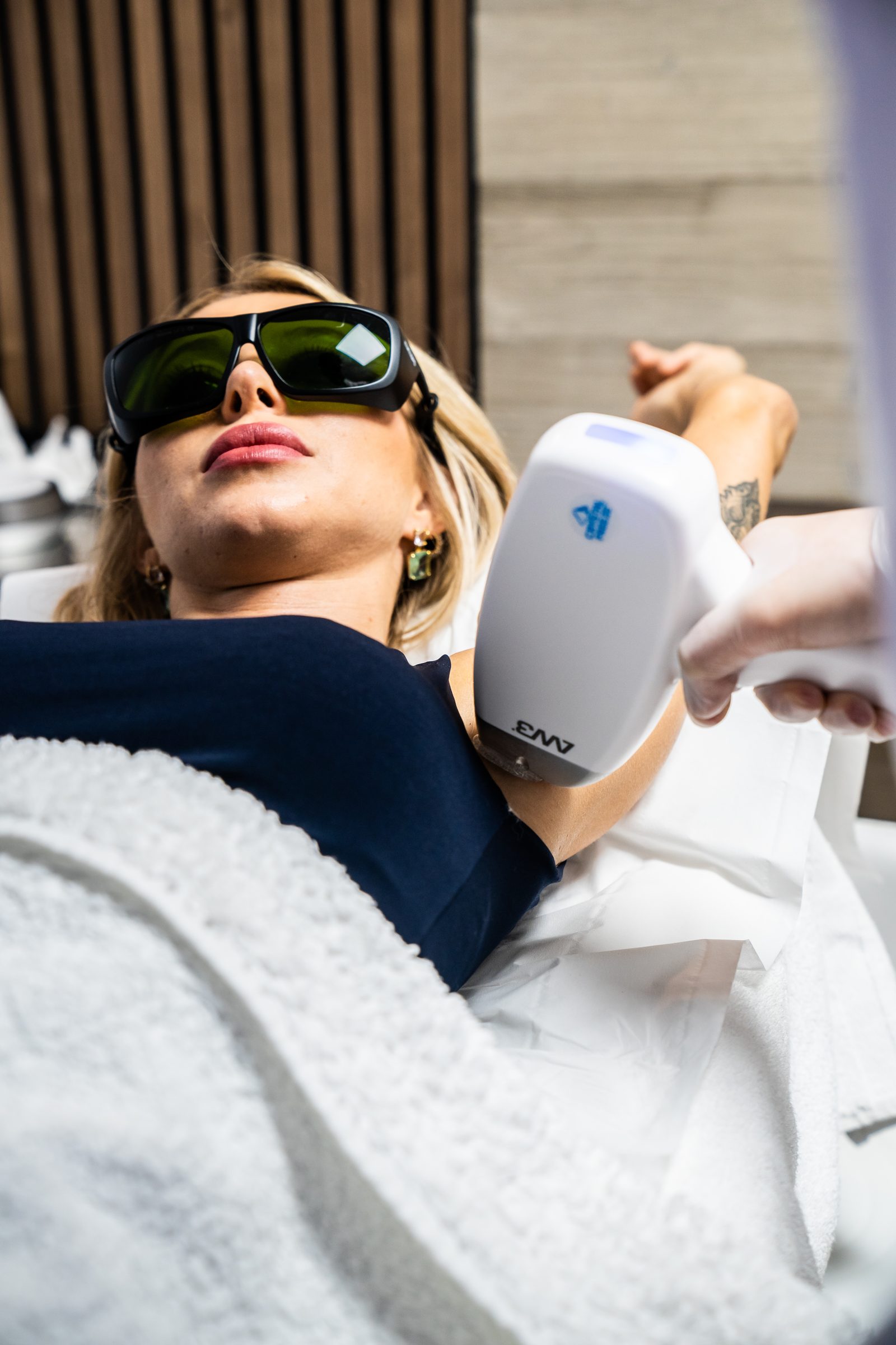 A client undergoing a laser hair removal treatment at Sorellina Clinic