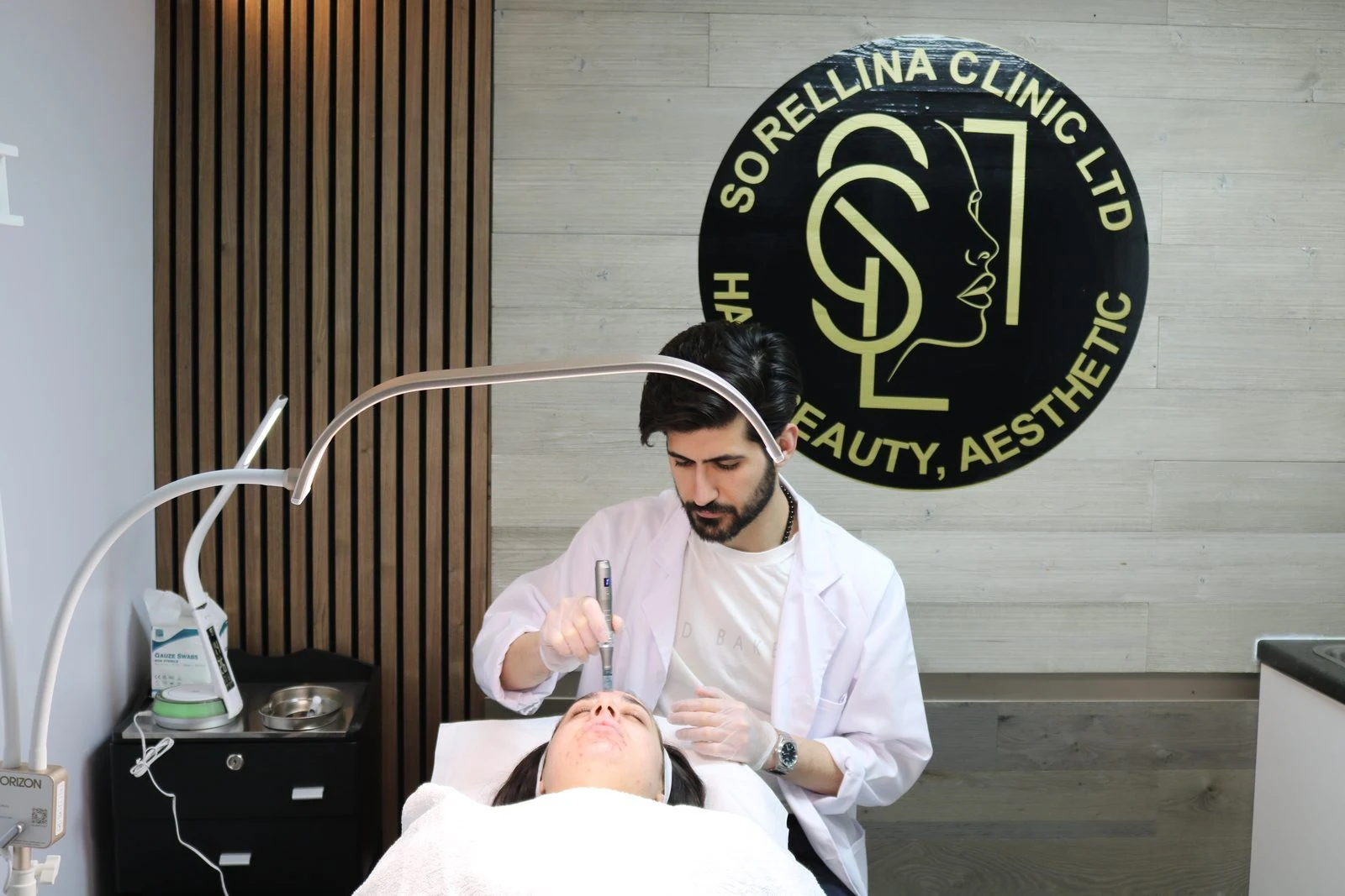 A practitioner performing a medical-grade microneedling treatment at Sorellina Clinic
